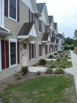 Outside view of residential buildings standing in a row