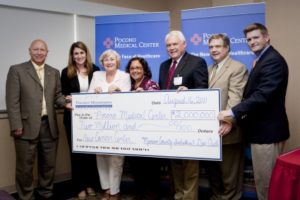 Elected officials and PMEDC present a Local Share Account for Monroe County grant to Pocono Medical Center for the New Cancer Center 